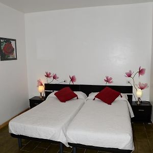 Kamer met een Queen Size Bed